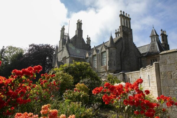 Picture of Lauriston castle with red flowers on the bottom of the frame