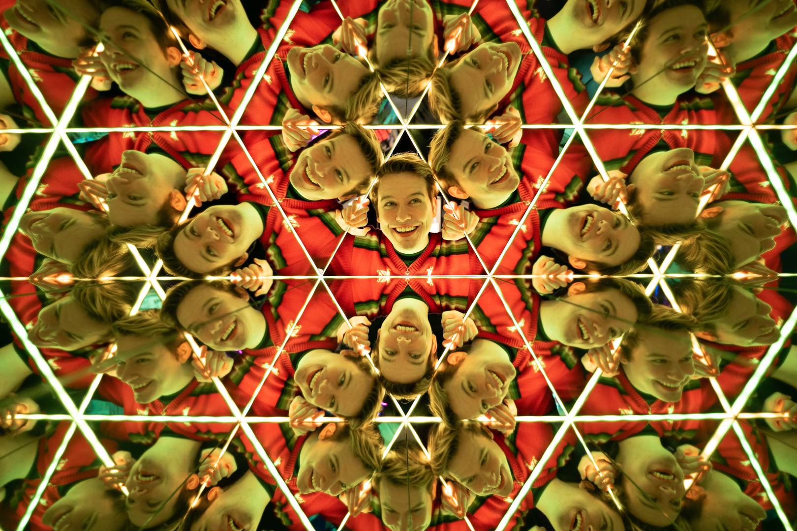 A boys face reflected many times, in the Kaleidohead exhibit at Camera Obscura & World of Illusions, Edinburgh, Camera Obscura & World of Illusions, Edinburgh
