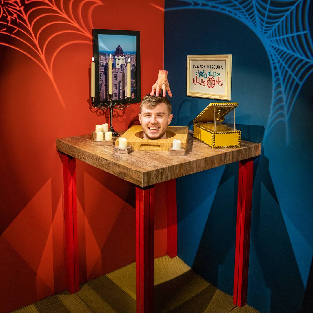 A man with his head on a chopping board. In the Severed Head exhibit at Camera Obscura, Edinburgh,© Camera Obscura & World of Illusions, Edinburgh