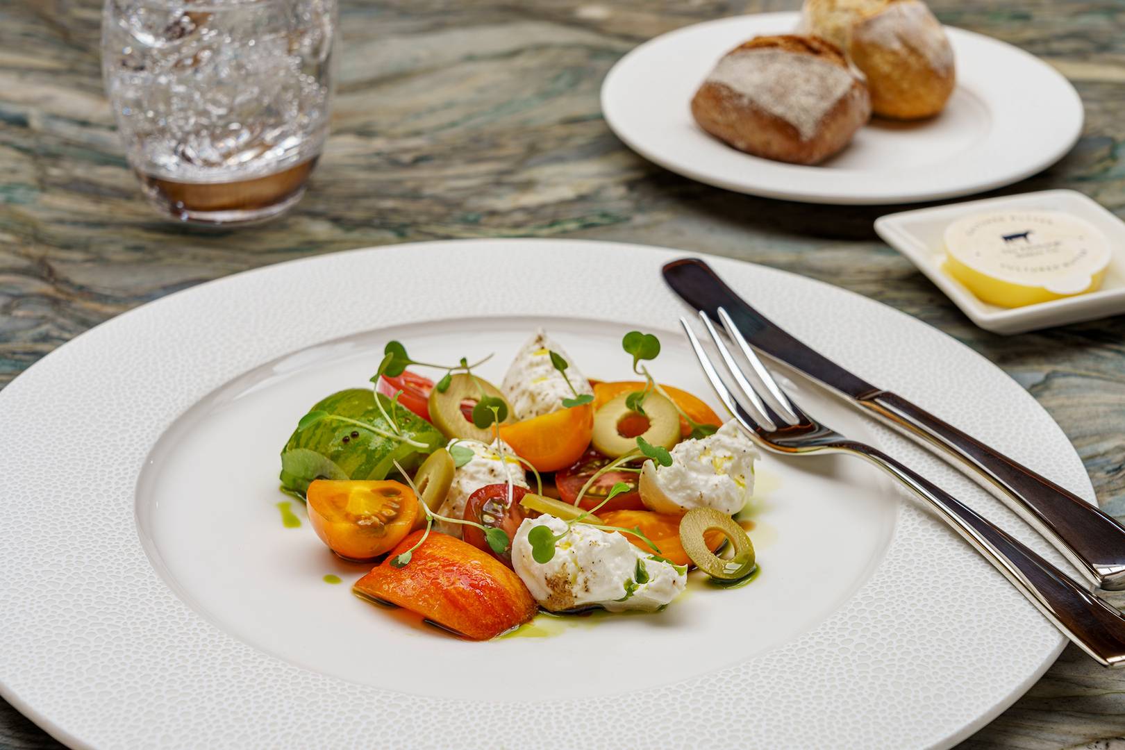 A dinner plate containing heritage tomatoes. , Brendan MacNeil