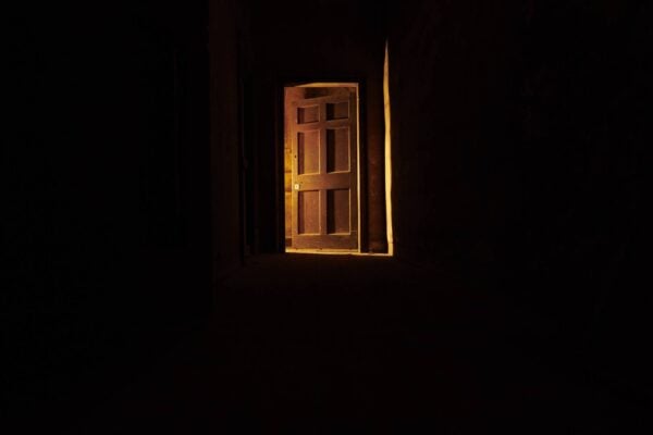 Light shining through door into dark corridor, The Real Mary King's Close