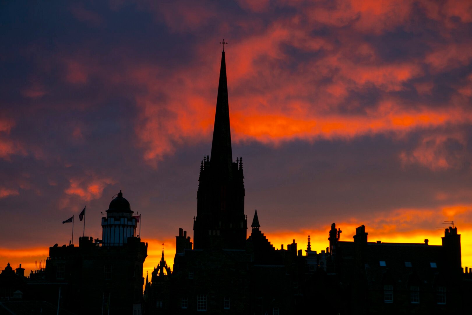 Sunsetting over The Hub in Edinburgh. Red sky.