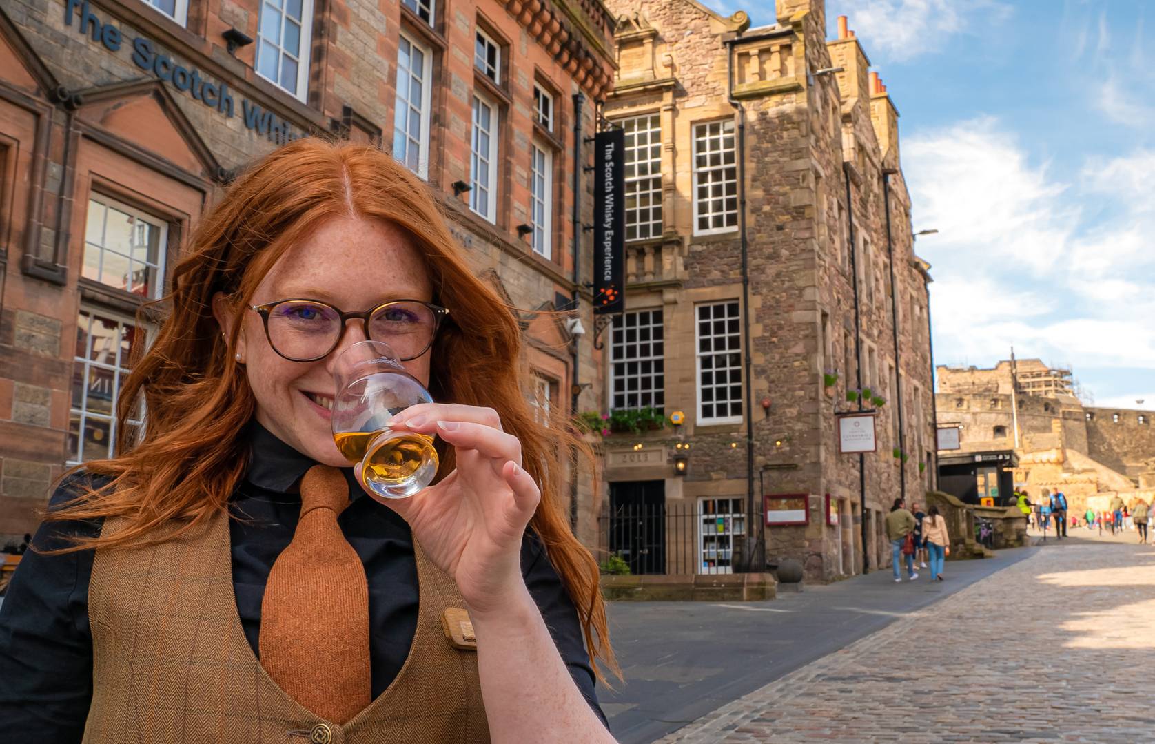 The Scotch Whisky Experience building with welcome team member ,© The Scotch Whisky Experience