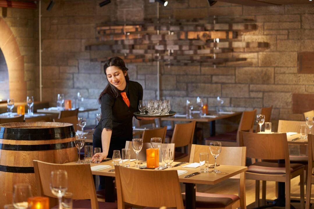 Amber restaurant with server ,© The Scotch Whisky Experience