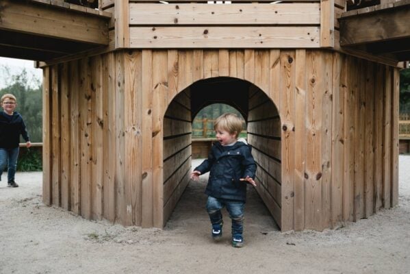 Young child playing in MiniMaze at Fort Douglas - located at Dalkeith Country Park, Dalkeith Country Park