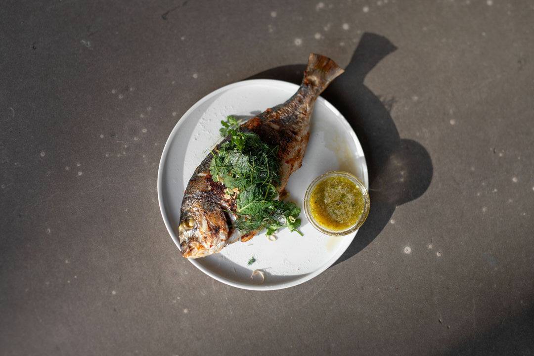 Whole grilled sea bream + herb salad + green nam jim