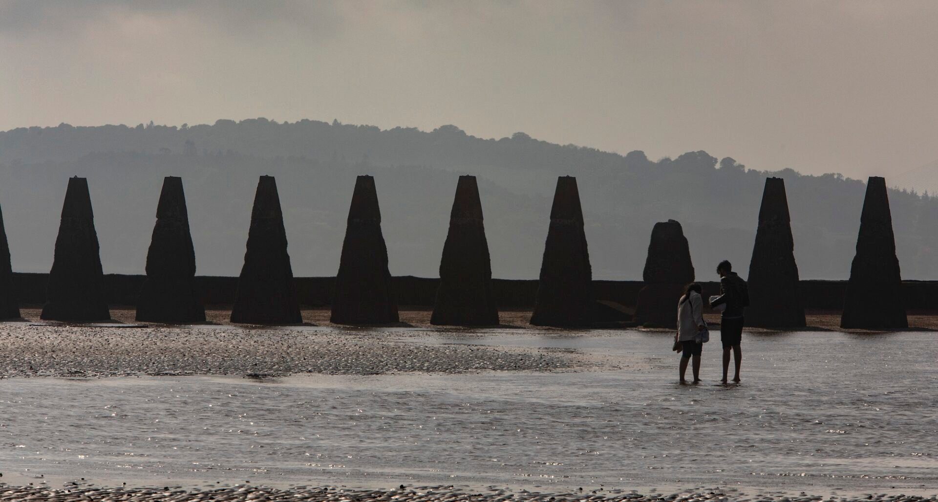 Cramond, couple walking on beach