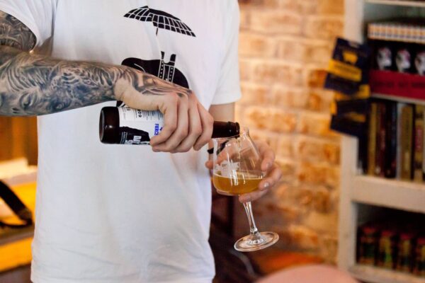 Pouring craft beer into a tasting glass, ScotBeer Ltd