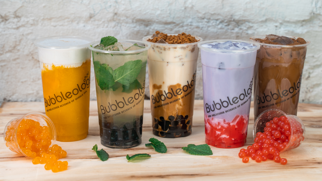 Image of five different coloured cups of bubble tea