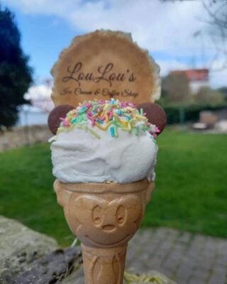 A cheeky monkey  cone with delicious  equis vanilla  ice cream