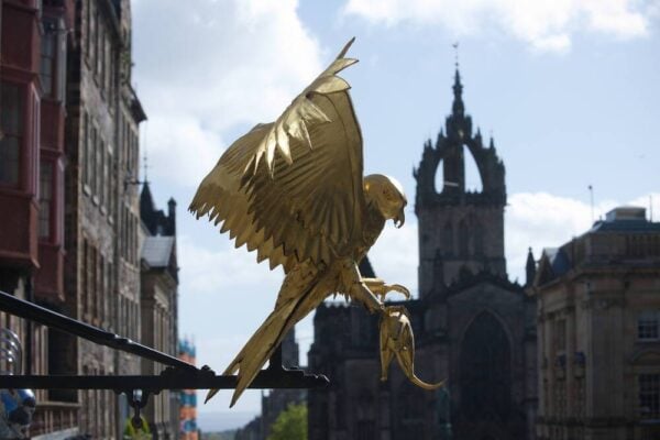 The view down the Royal Mile towards St Giles’ Cathedral, from Gladstone’s Land. The golden gled (kite) marks the entrance., National Trust for Scotland