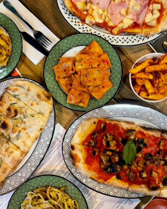 Image of various savoury Italian dishes on table