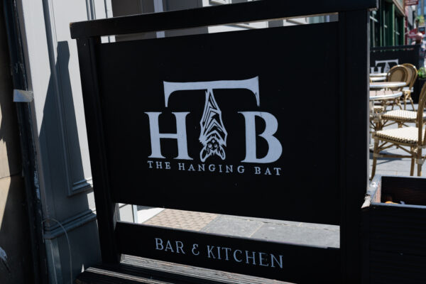 Hanging Bat sign outside entrance