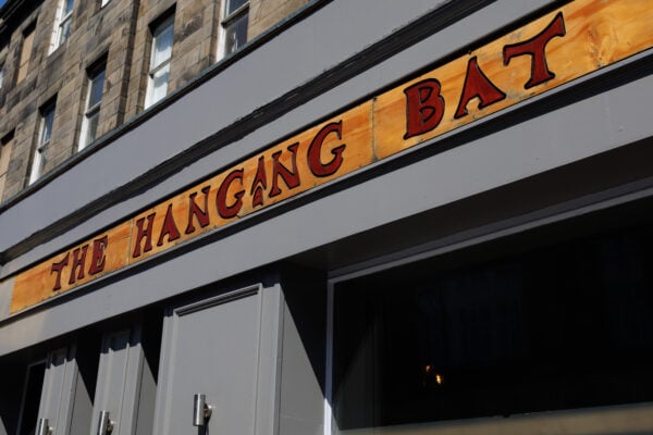 The sign of the Hanging Bat bar