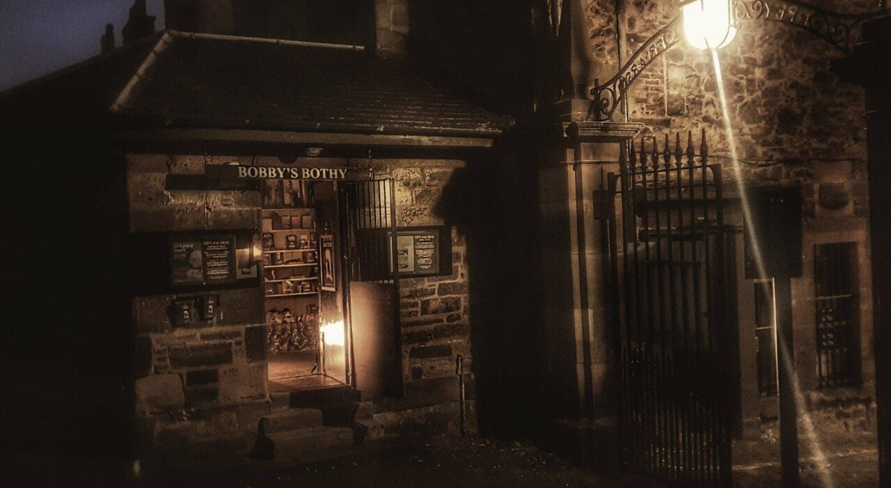 Outside of spookily lit old building,© City of the Dead Tours