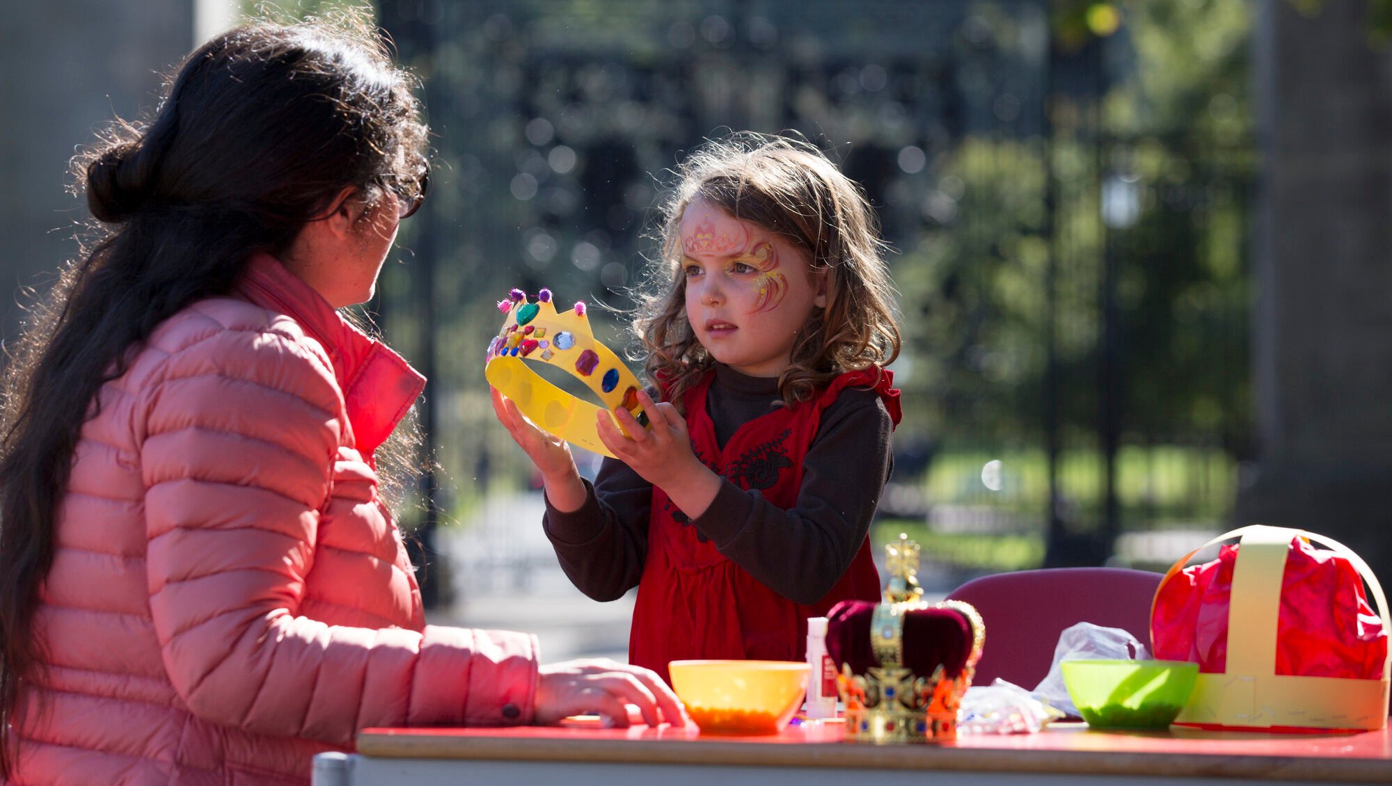 Mother and child decorating crowns at Midweek Makes event at the Palace of Holyrood House