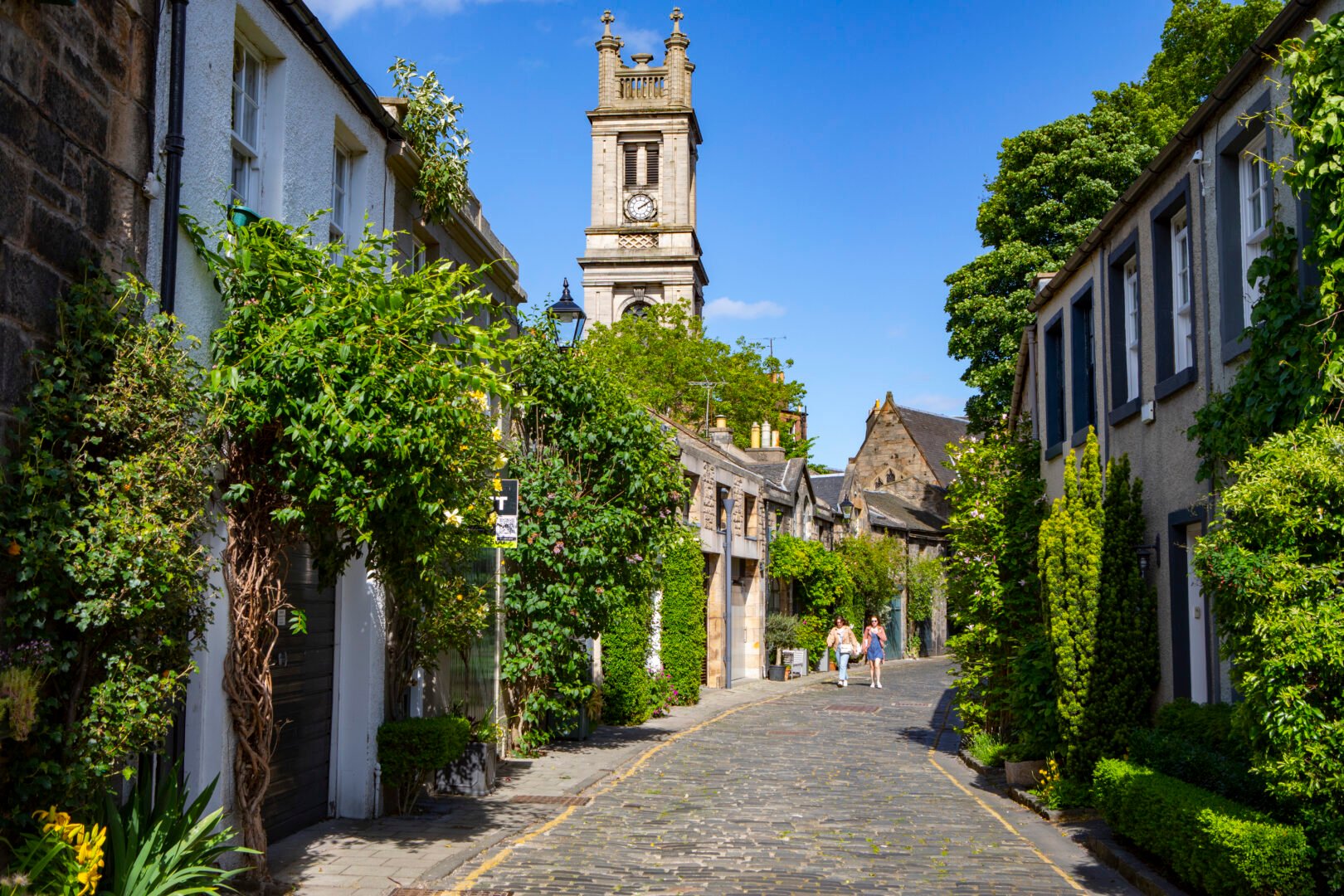 Circus Lane, day shot with houses situation along a winding street.