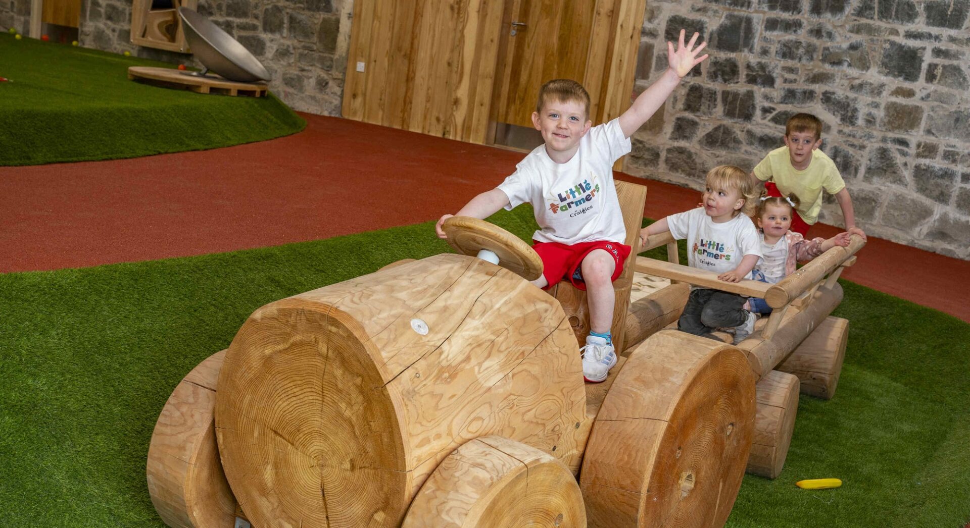 Craigies Farm,Little Farmers on wooden tractor