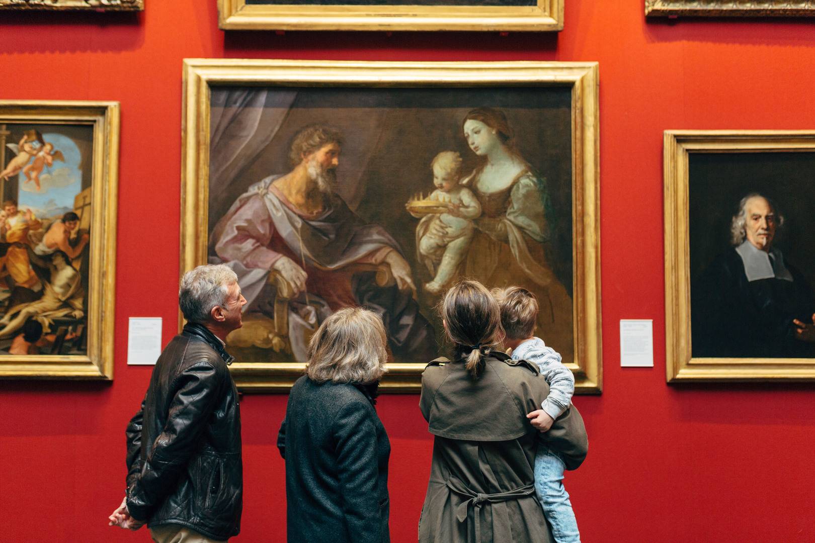 A family group looking at a painting, National Galleries of Scotland