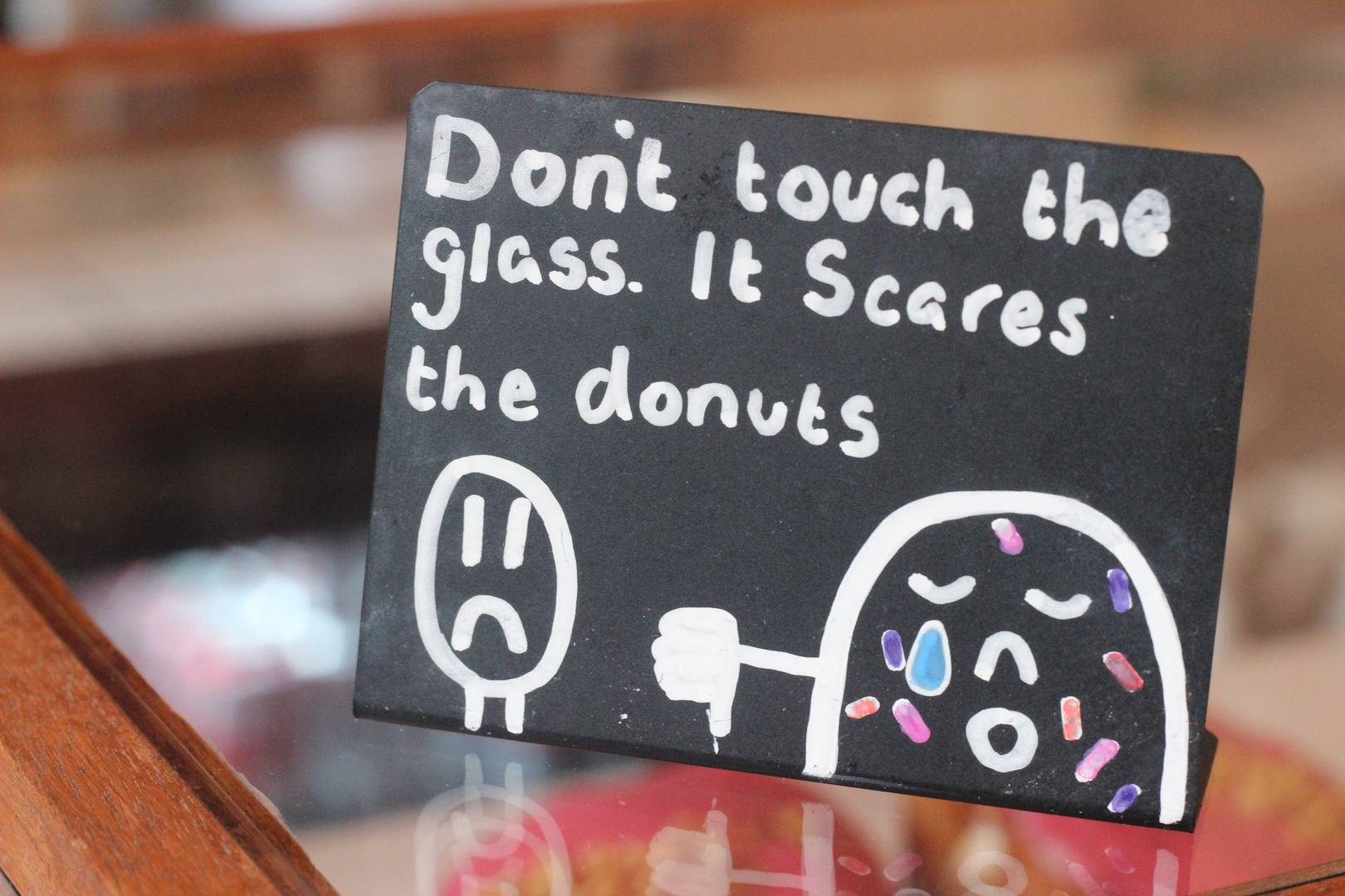 Image of funny sign at Underground Donut Tour