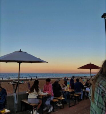 Sunset image of outdoor tables at beach