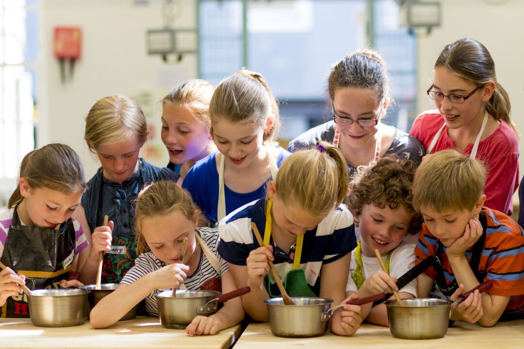 Children taking place in Cooking class at Edinburgh New Town Cookery School