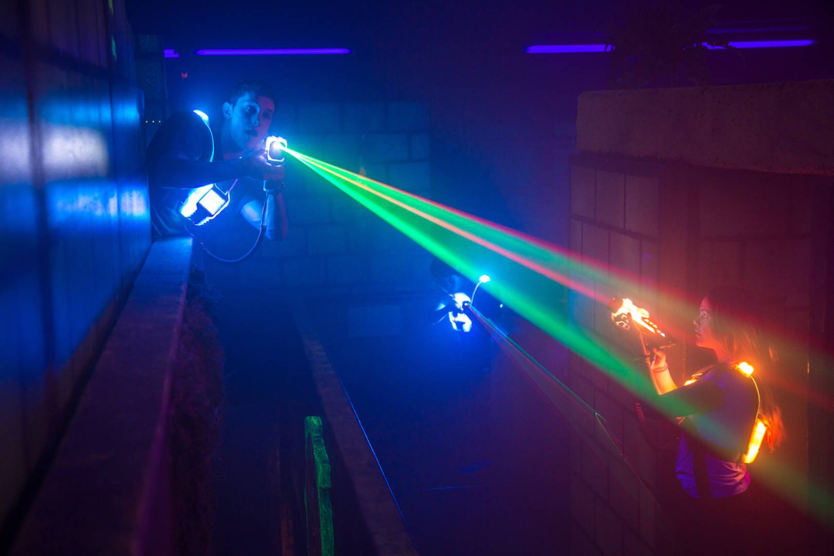 Friends playing laser tag at Laser Station