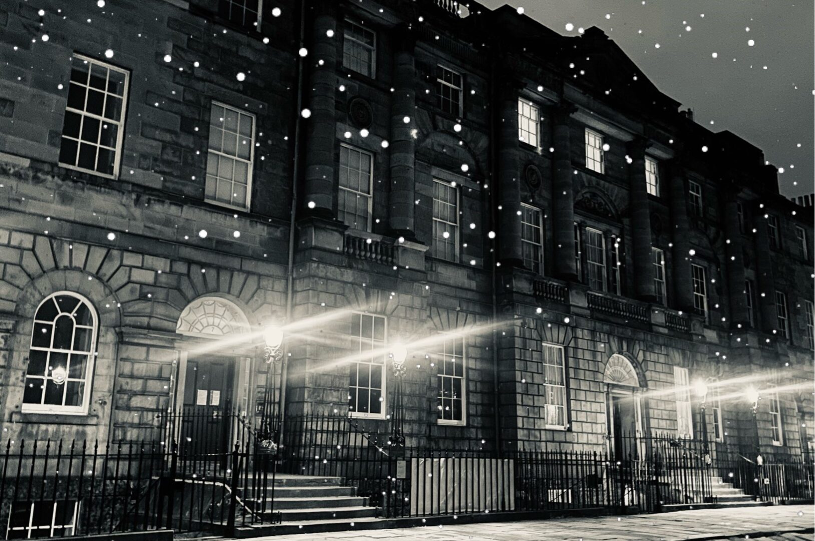 Night time image of a street in Edinburgh with virtually added snow shower