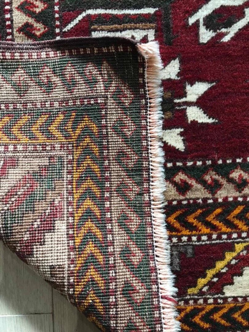 Close-up of folded over rug