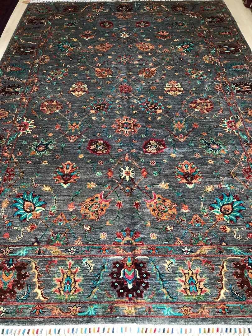 Turquoise multi-coloured rug