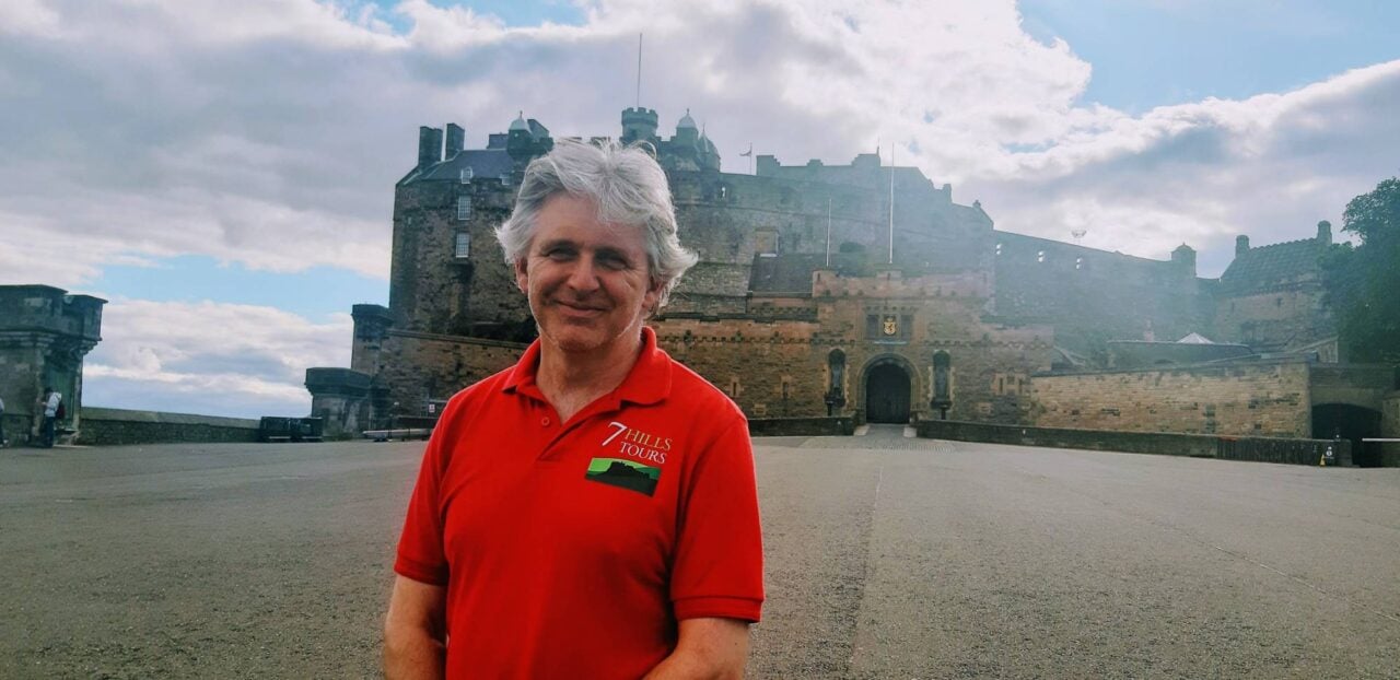 Dr Moray Grigor of 7 Hills Tours Ltd, in front of Edinburgh Castle,© Moray Grigor