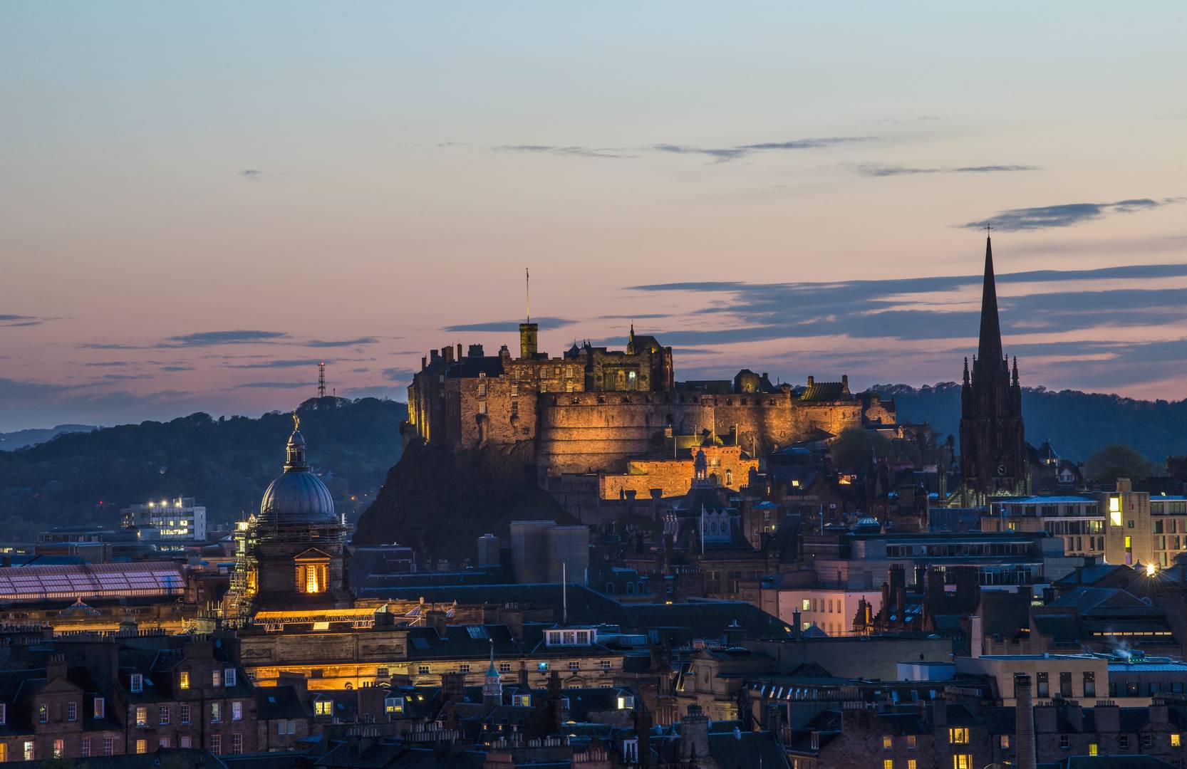 Image of Edinburgh at dusk featuring Edinburgh Castle