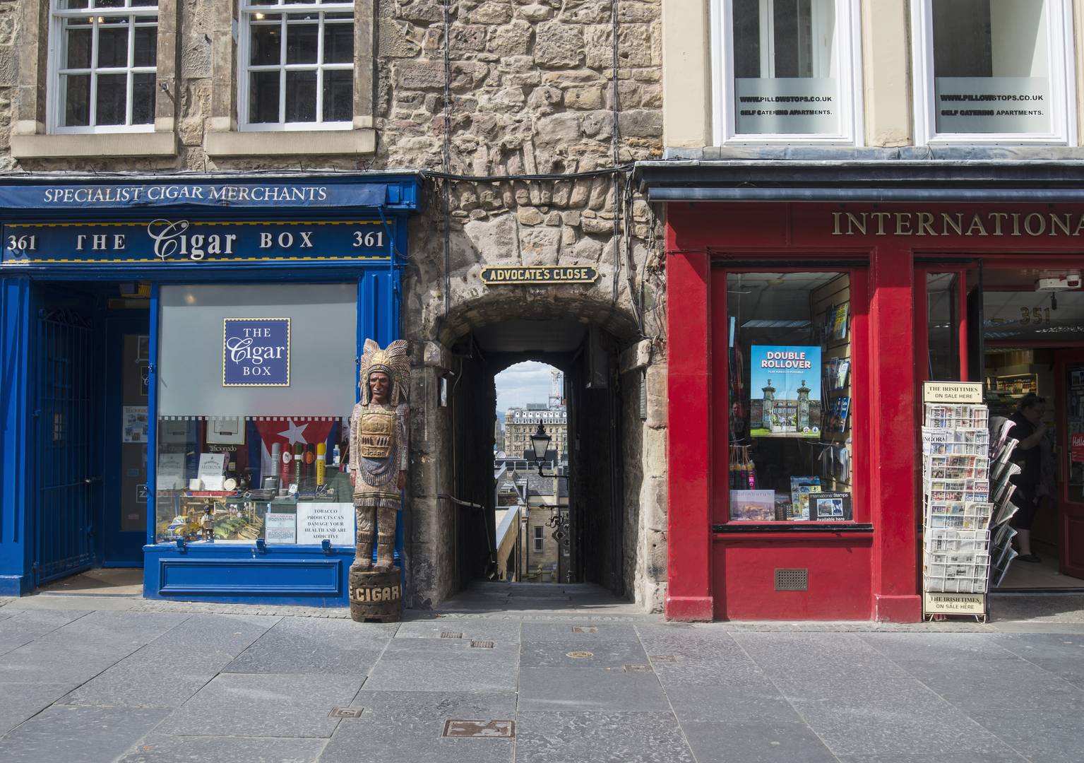 Image of Advocate's Close with colourful shop-front's at either side