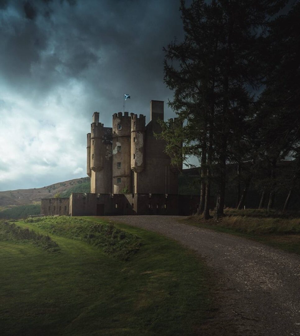 Braemar Castle on a gloomy day with dark clouds