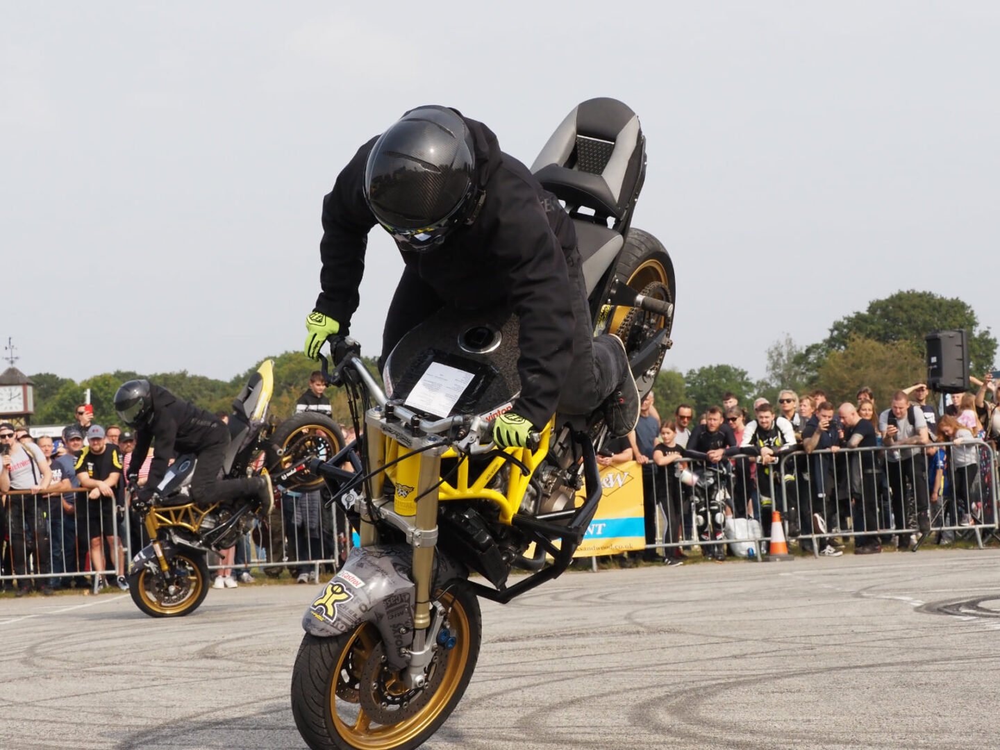 The Scottish Motorcycle Show stunt demonstration with Motorcyclist doing back wheelie