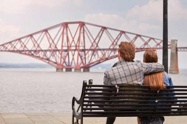 Young Couple on Bench with Forth Bridge in background