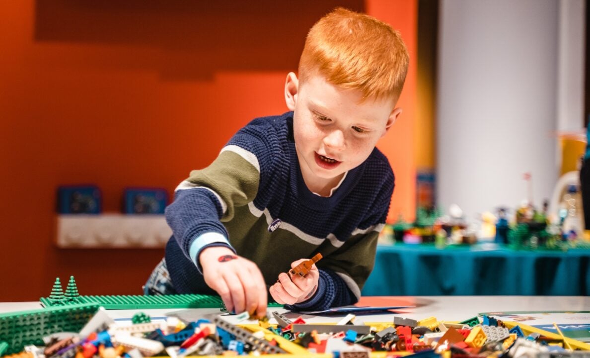 Boy building with Lego at the Edinburgh Science Festival in the City Art Centre
