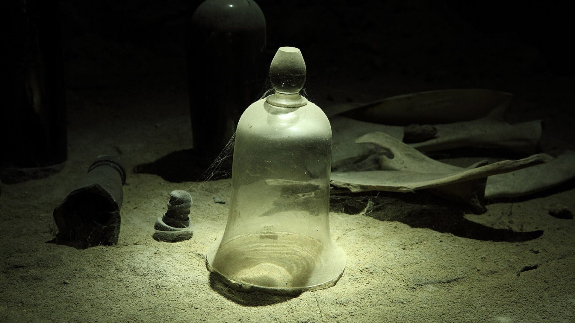 A glass bell shaped cloche jar Artefacts found in Edinburgh's underground vaults.