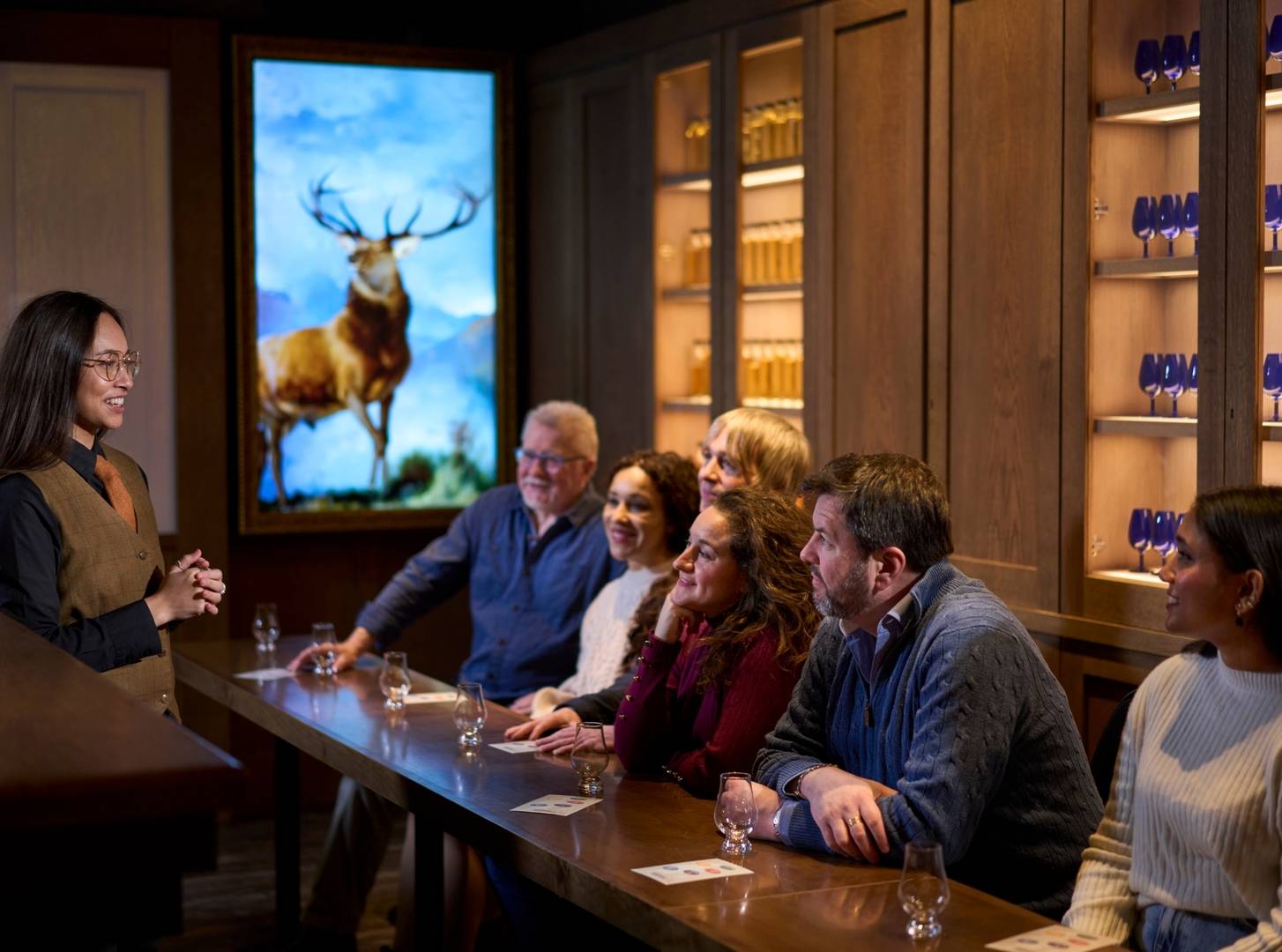 Tour guide and visitors within the Blender's sample room at The Scotch Whisky Experience,© The Scotch Whisky Experience