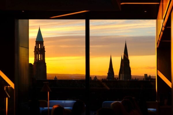 A view of the sunrise from the 1820 Rooftop Bar at Johnnie Walker Princes Street