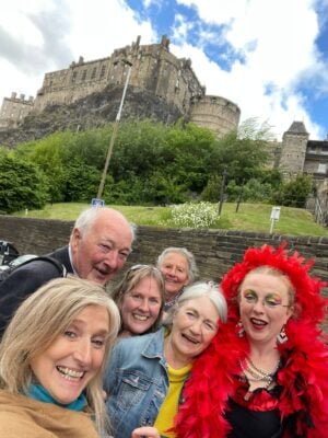 Tour guide Lola with Edinburgh Castle as back drop