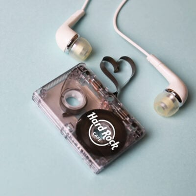 Hard Rock Cafe Cassette tape with tape in heart shape and Ear phones.