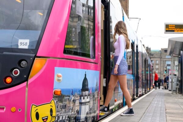 Taylor Swift Fan boarding an Edinburgh Tram