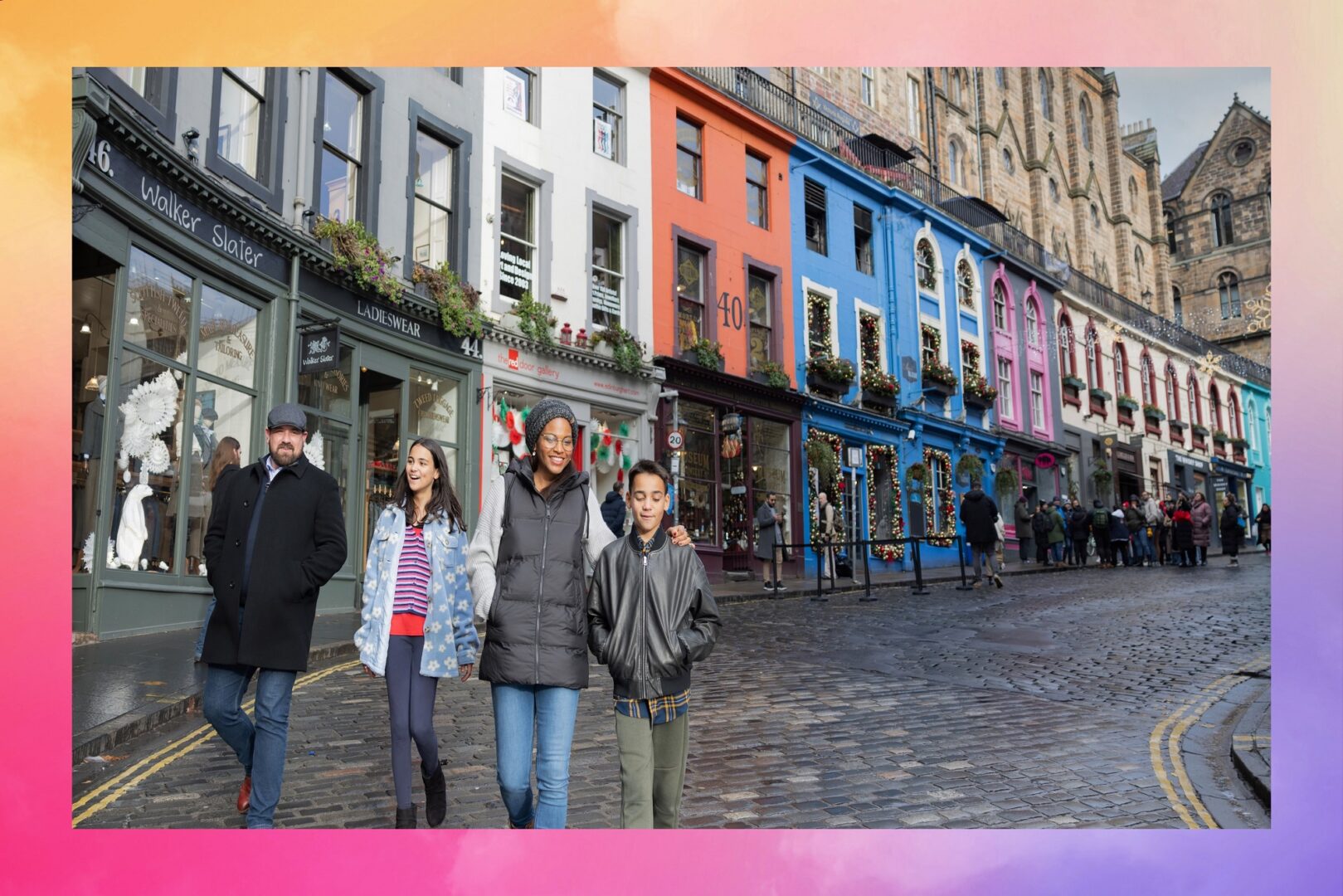 Family walking down Victoria Street in Edinburgh.png