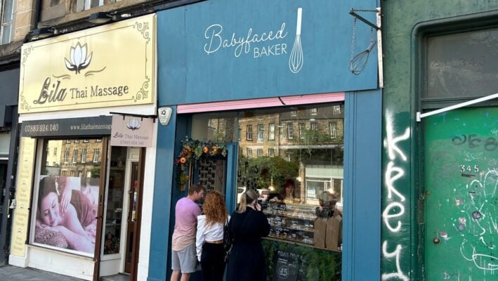 Exterior of Babyfaced Baker on Leith Walk with three customers queueing outside.