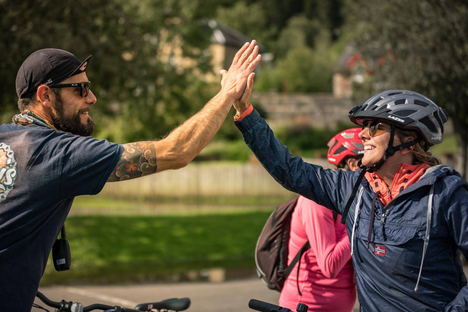 High five from Ricky's Bicycle Tours leader to a tour participant