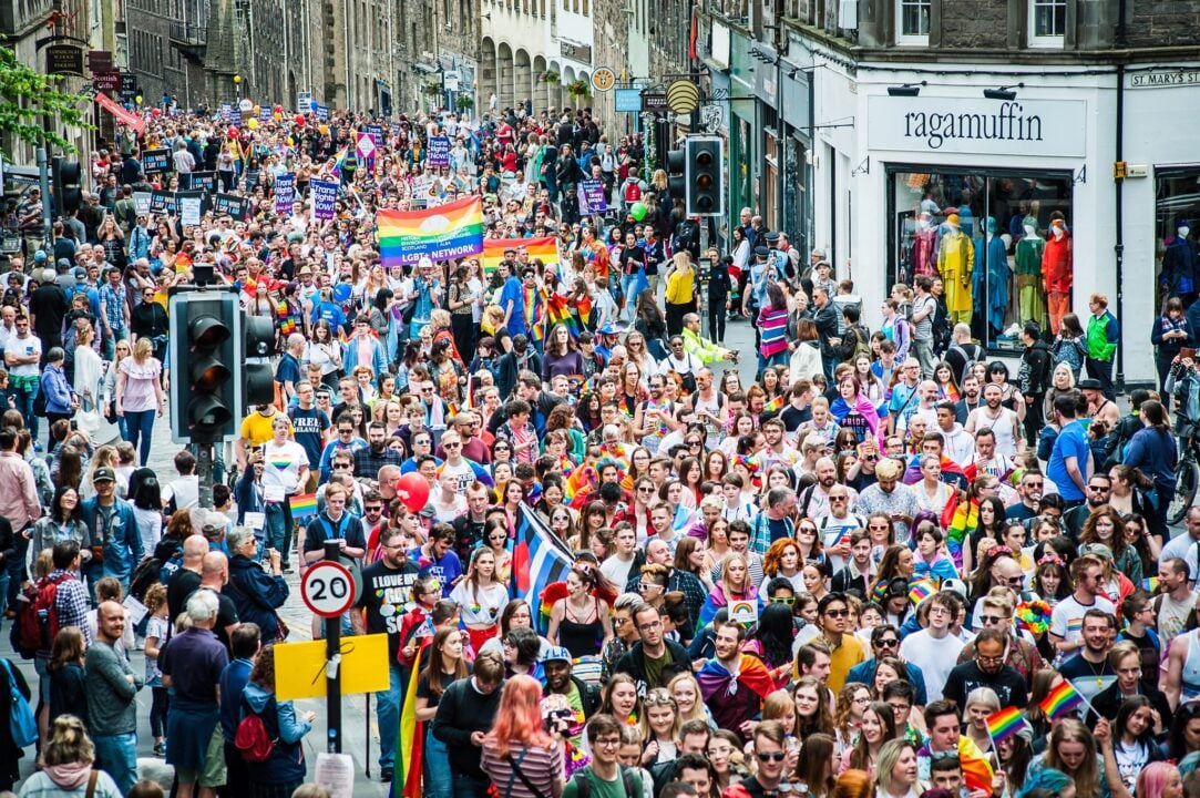 Crowd of people on the Pride March through Royal Mile