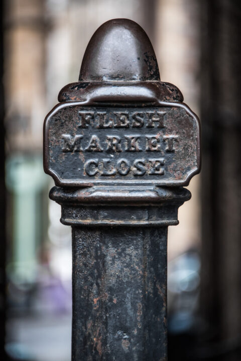 antique metal post at Fleshmarket Close in Edinburgh, Scotland
