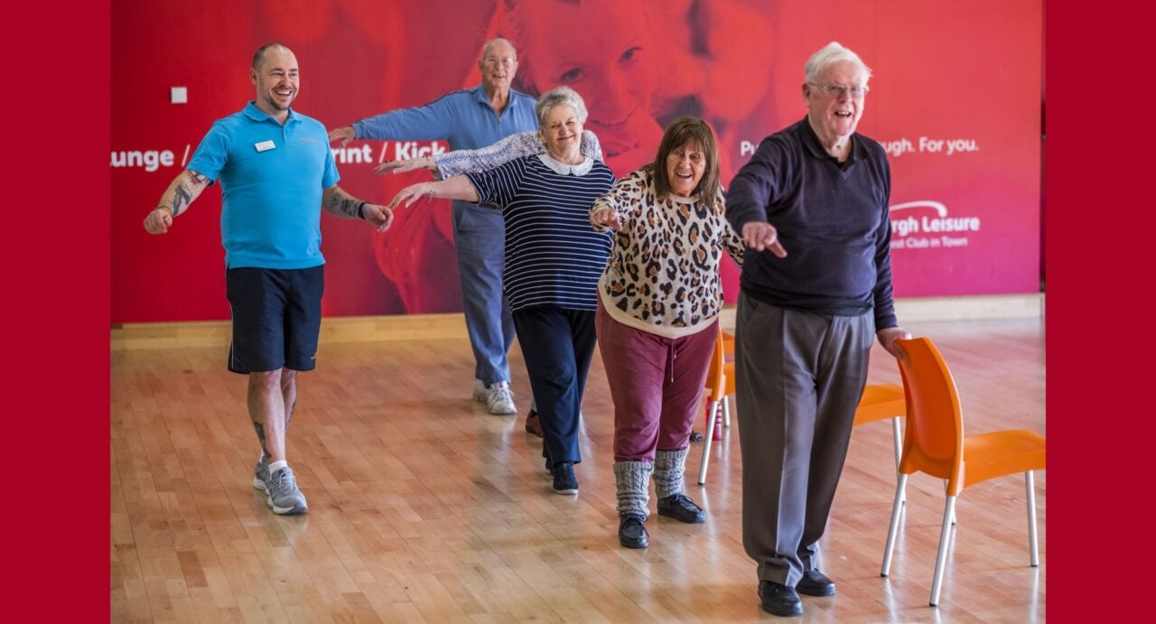 Four happy customers enjoying an exercise class at Edinburgh Leisure