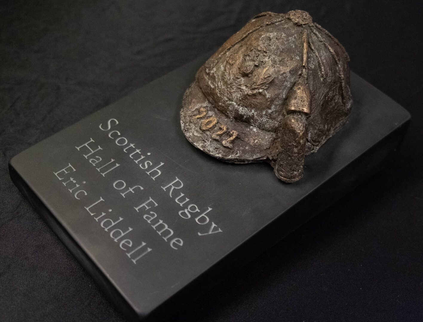 An Eric Liddell Sculpture of his Scotland Cap from 1922.